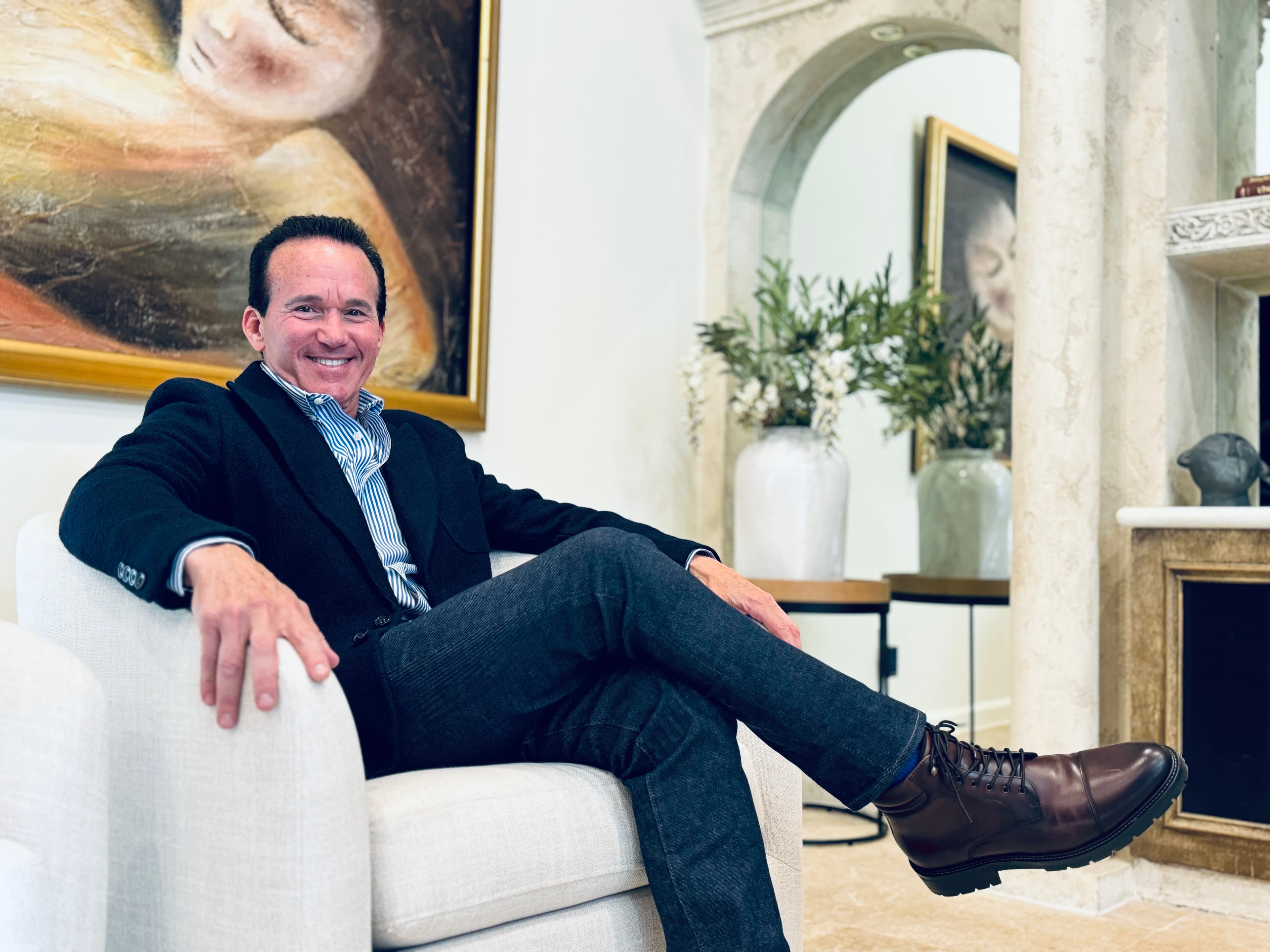 larry sitting in a chair